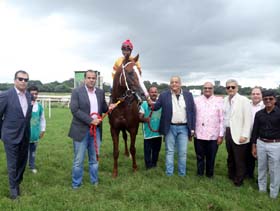 Gautam Lala, Haidar Soomar and the other partners leading in Arrived (Sandesh up), winner of Mayor`s Trophy at Pune on Friday.