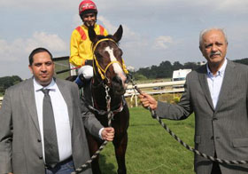 Trainer Behram Cama and Jayadev Mody leading in Scaramouche (T S Jodha up), winner of N K Pudumjee Trophy at Pune on Saturday. Photo credit Amit Gupta