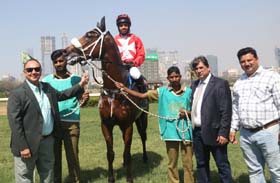 Celestial (Vivek G up), winner of P D Bolton Trophy being led in by trainer Pesi Shroff and winning connections at Mumbai on Sunday. Photo credit Amit Gupta