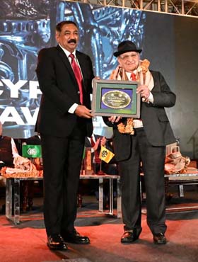 Dr Cyrus Poonawalla being honoured by Mysore Race Club Chairman K T Balakrishna for his outstanding contribution to the sport of horse racing during the awards night of the Indian Turf Invitation Cup weekend races on Saturday.