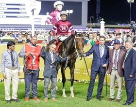 Magnitude ( J Oritz up), winner of the Dubai World Cup, being led in by trainer Steve Asmussen and the winning connections at Meydan on Saturday.