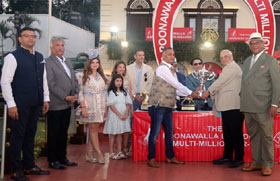 Adar Poonawalla presenting the Gr 1 Poonawalla Breeders` Multi-Million, trophy to owners Ashok Ranpise, Daulat Chabria and Rajendra, joint owners of Excellent Lass which won the event at Mumbai on Sunday.