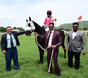 Stormrider (A Ashhad Asbar up), winner of the ARAKALGUDU PLATE being led in by trainer Vinesh V Naik on Wednesday races at Mysore.
