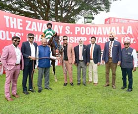 Sovereign King, (Anthony Raj up), winner of Zavaray S Poonawalla Colts Championship Stakes at Bangalore on Sunday being led in by Trainer Adhirajsingh Jodha, the joint owners and breeders Gurupal Singh and Angad Singh.
