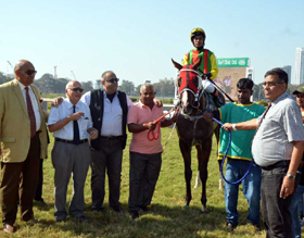 K H Vachha and trainer Narendra Lagad leading in Son Of A Gun (C S Jodha up), winner of A Campbell Trophy at Mumbai on Sunday.
